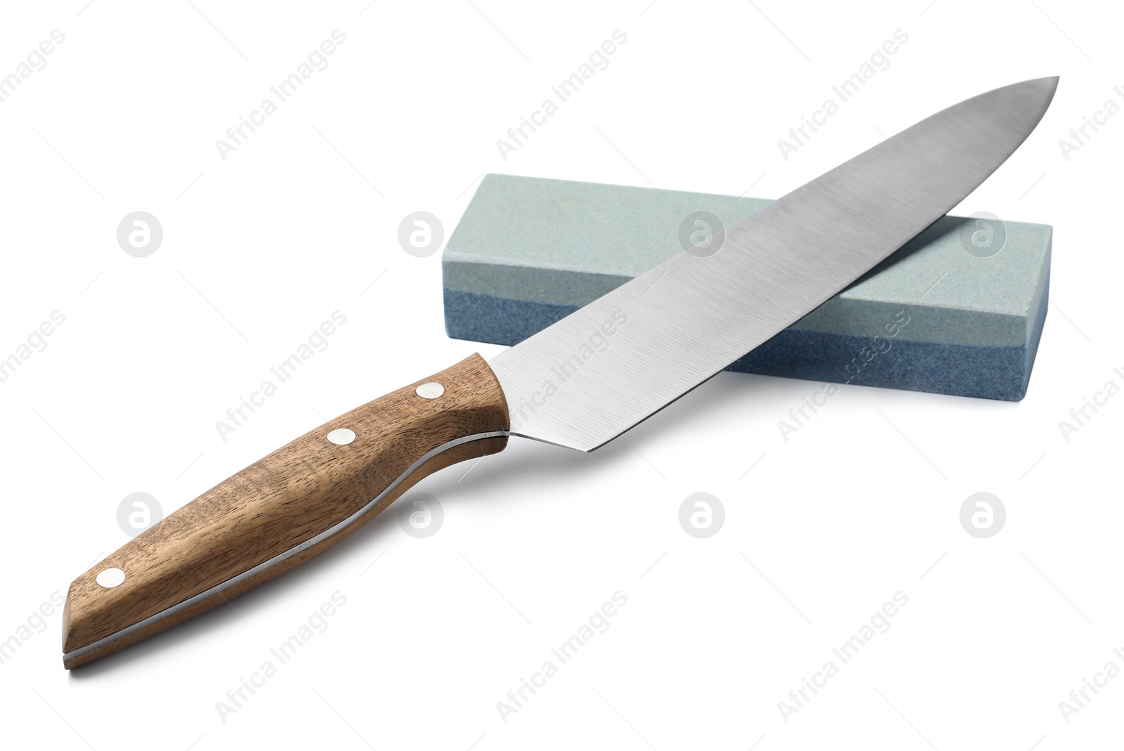 Photo of Sharp chief's knife and grindstone isolated on white