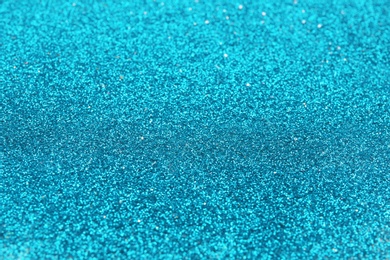 Closeup view of sparkling blue glitter background