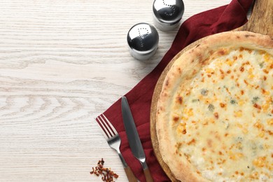 Photo of Delicious cheese pizza served on white wooden table, flat lay. Space for text