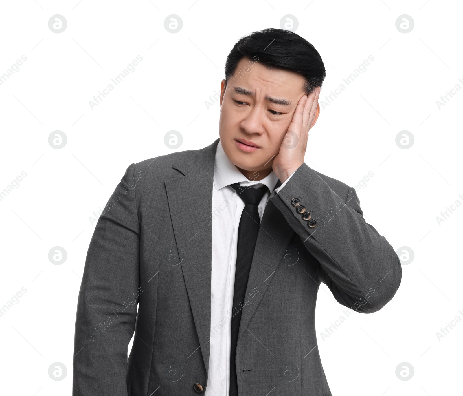 Photo of Tired businessman in suit posing on white background