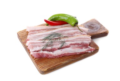 Pieces of pork fatback with chilli pepper and dill on white background