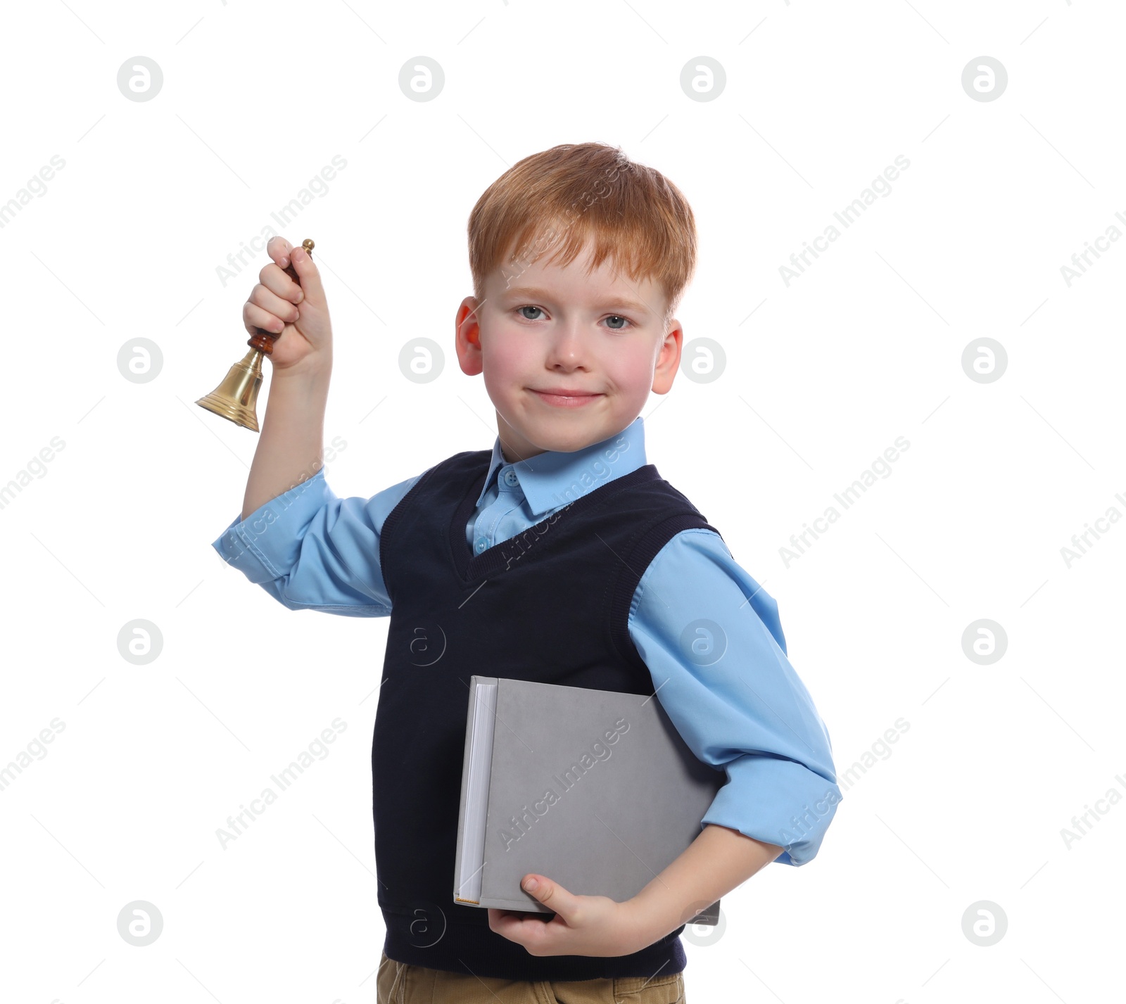 Photo of Pupil with school bell and book on white background