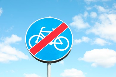 Traffic sign End Of Cycleway against blue sky