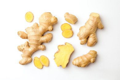 Photo of Fresh ginger on white background, flat lay