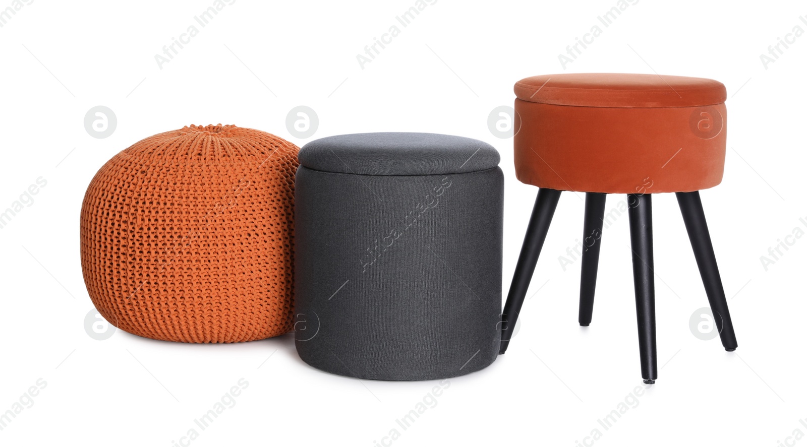 Photo of Different poufs on white background. Home design