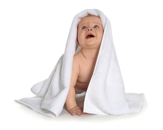 Photo of Cute little baby with soft towel on white background