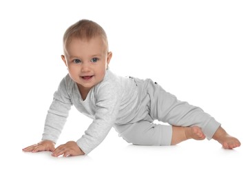 Cute little baby crawling on white background