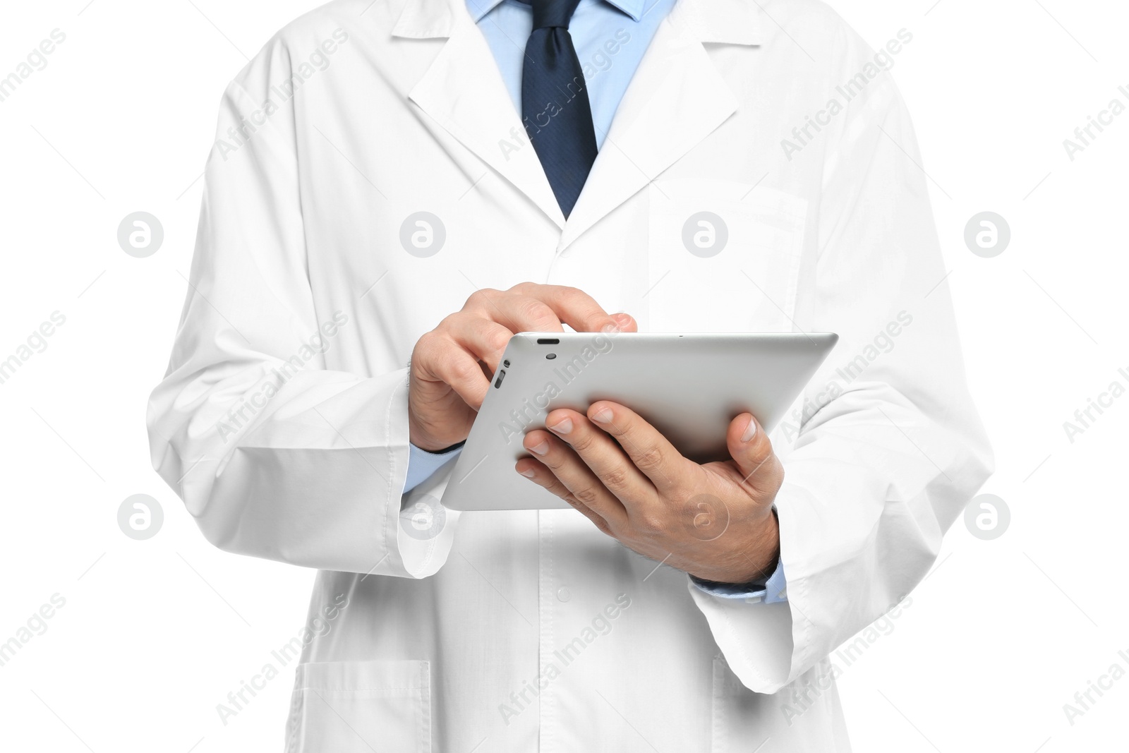 Photo of Male doctor holding modern tablet on white background, closeup