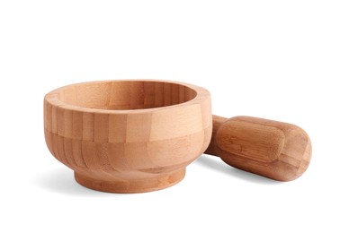 Photo of Wooden mortar and pestle on white background