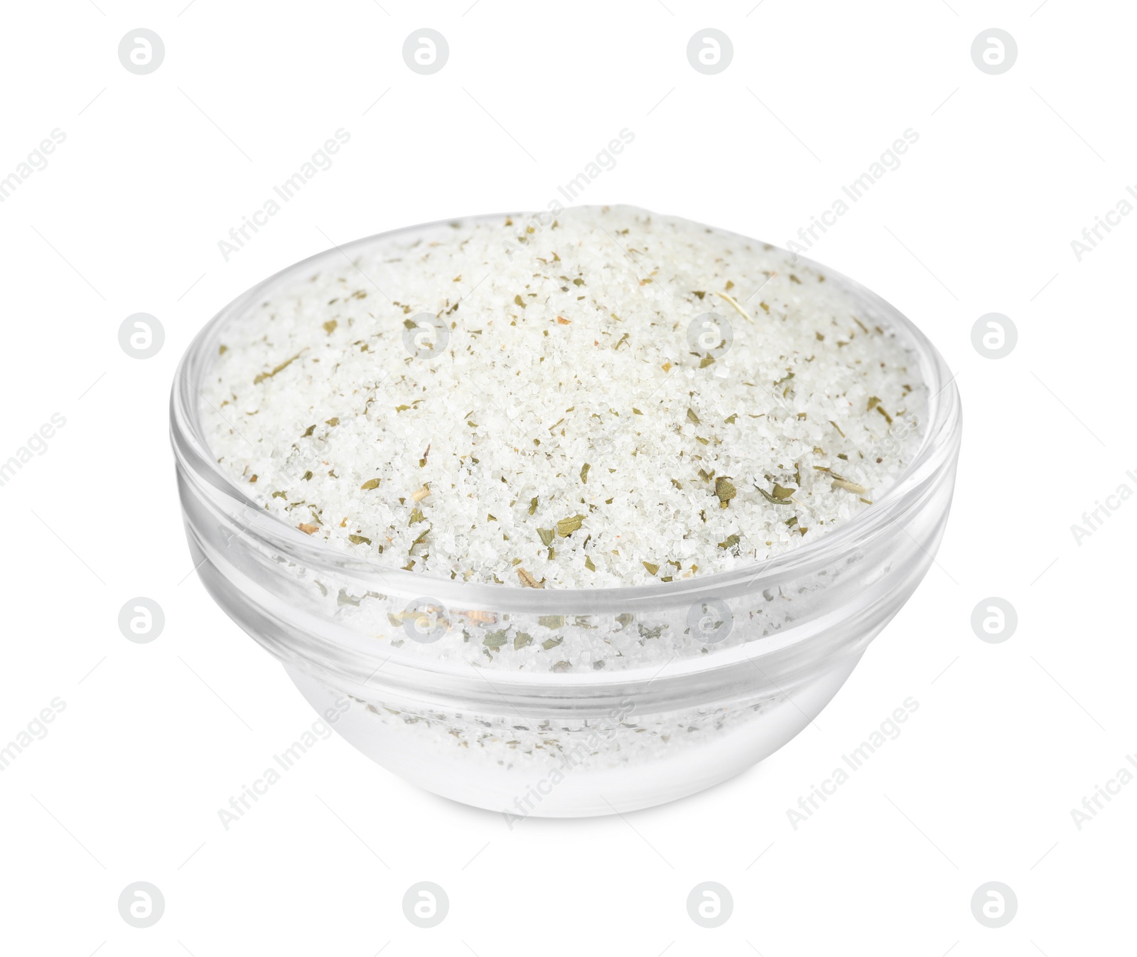 Photo of Natural herb salt in glass bowl isolated on white