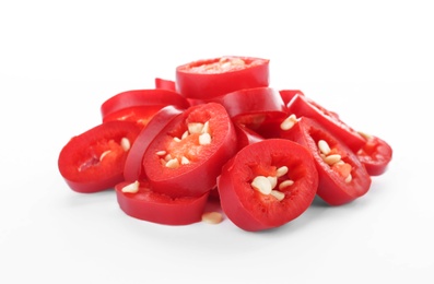 Pile of cut chili peppers on white background