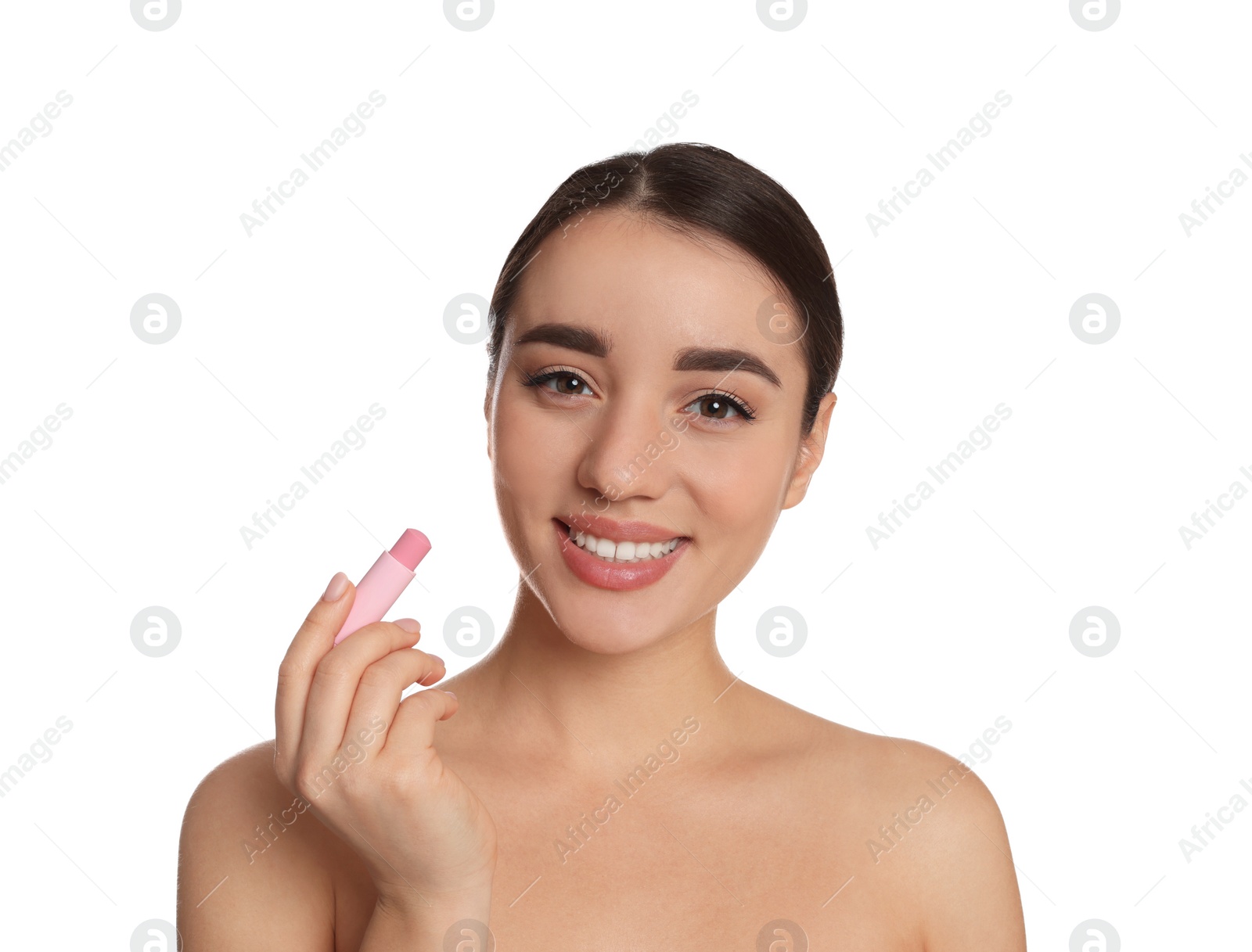 Photo of Young woman with lip balm on white background