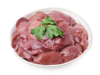 Photo of Bowl of raw chicken liver with parsley isolated on white