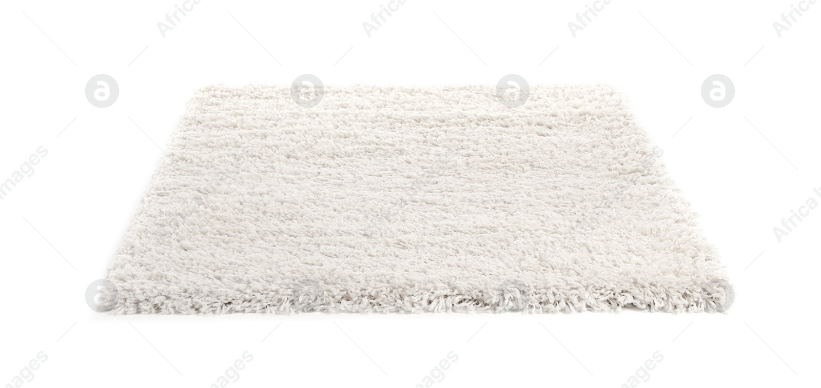 Photo of Fuzzy carpet on white background. Interior element