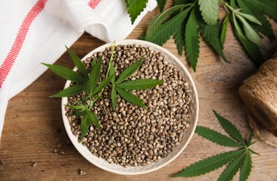 Photo of Flat lay composition with hemp seeds on wooden table