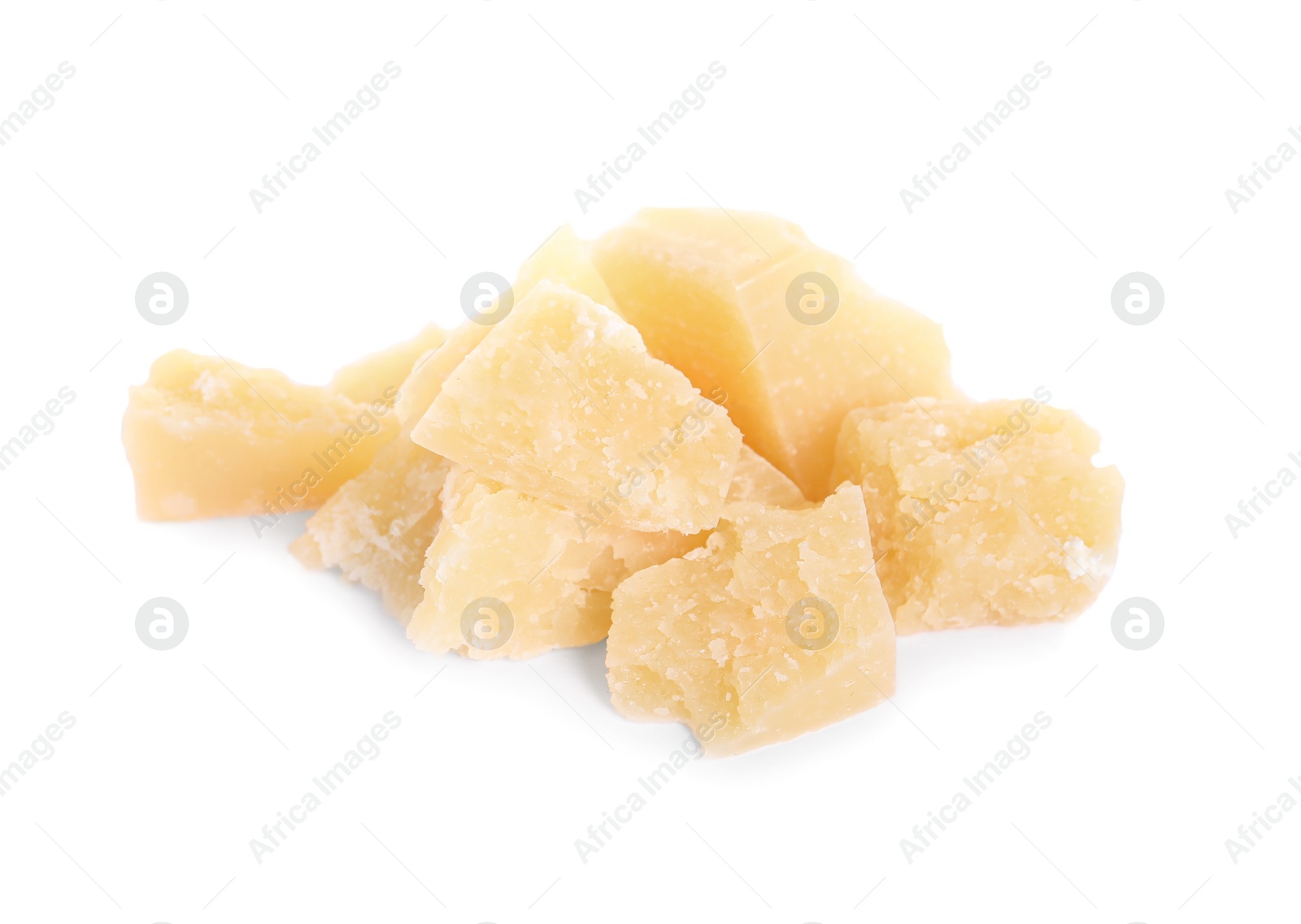 Photo of Pieces of delicious parmesan cheese on white background