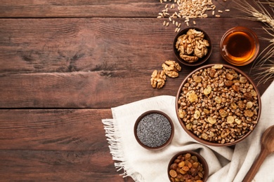 Photo of Traditional Christmas slavic dish kutia served on wooden table, flat lay. Space for text