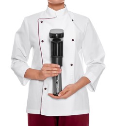 Photo of Chef holding sous vide cooker on white background, closeup