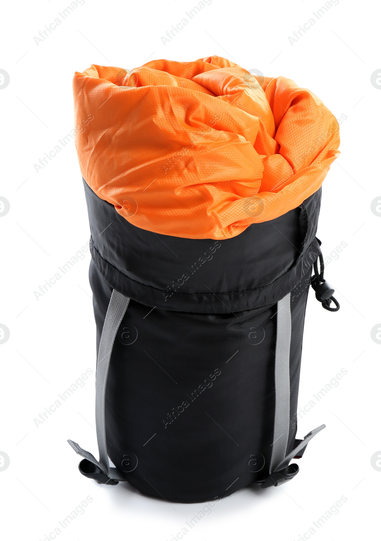 Photo of Rolled sleeping bag on white background. Camping equipment