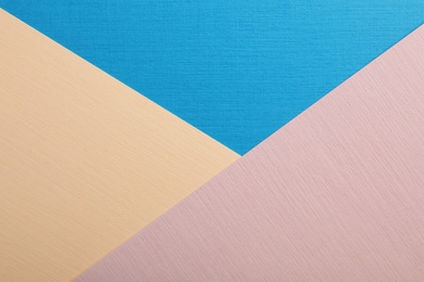 Photo of Colorful paper sheets as background, top view