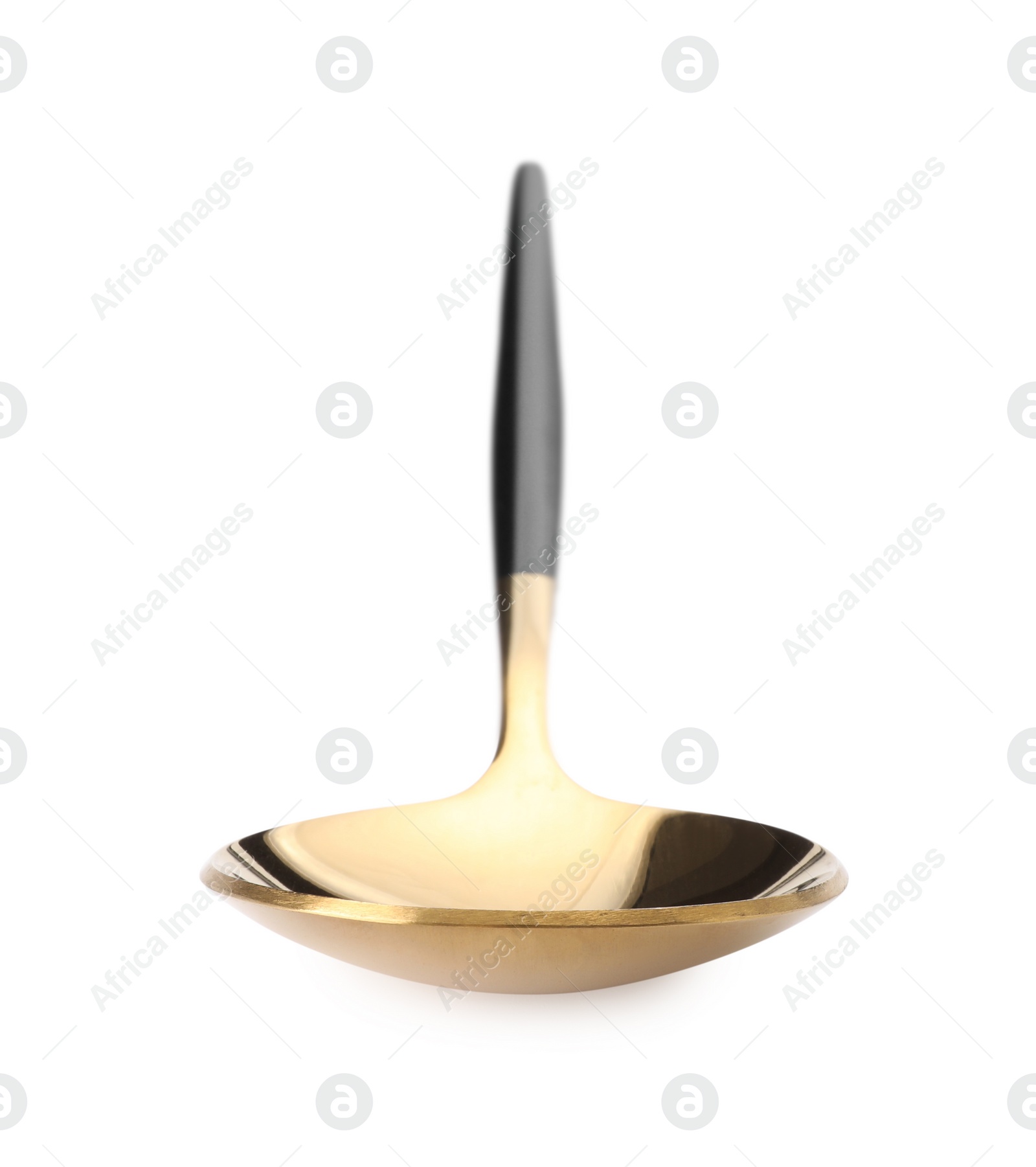 Photo of One shiny golden spoon with black handle isolated on white