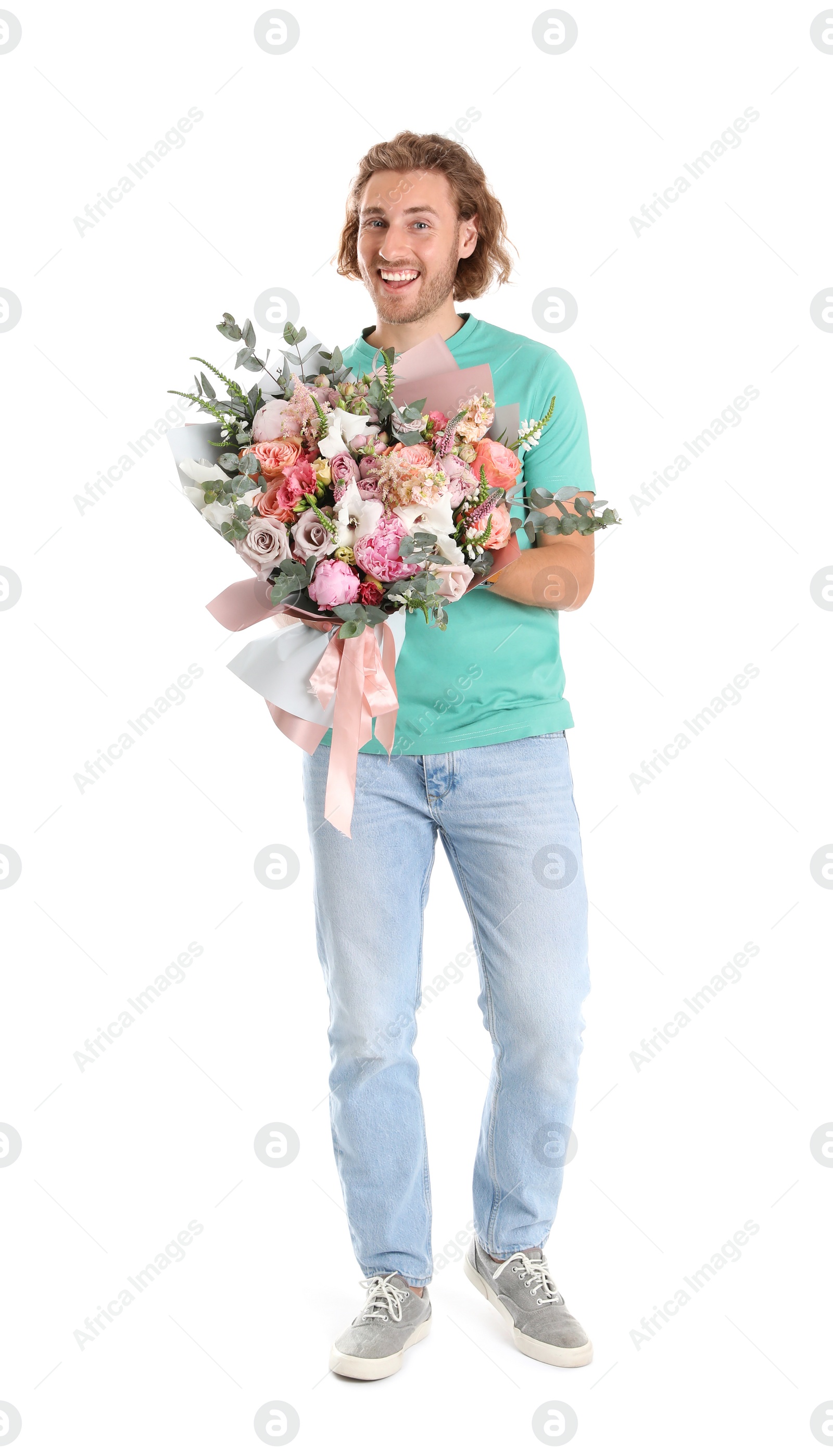 Photo of Young handsome man with beautiful flower bouquet on white background