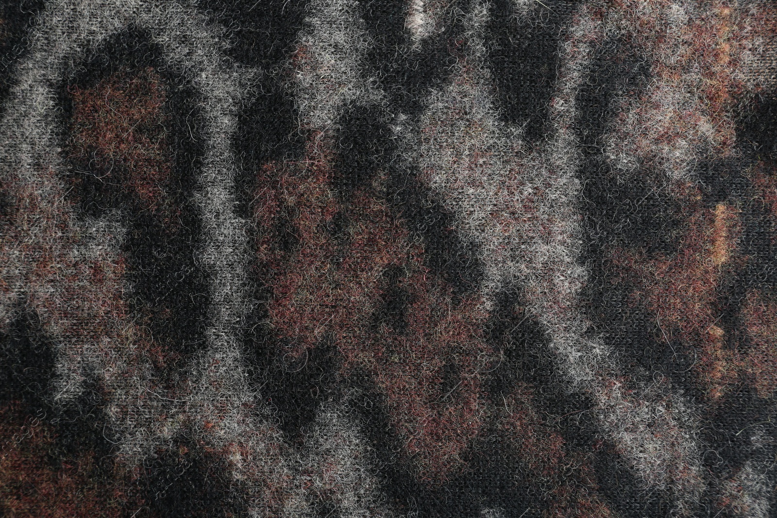 Photo of Texture of beautiful fabric with animal pattern as background, closeup