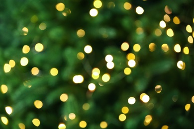 Photo of Abstract background with blurred yellow Christmas lights, bokeh effect