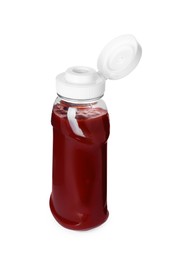 Bottle of tasty ketchup isolated on white