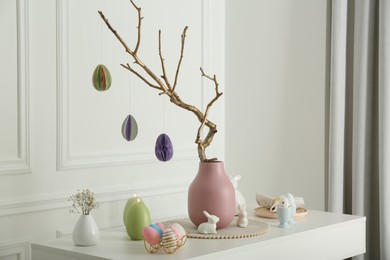 Beautiful festive composition with Easter decor on white table indoors