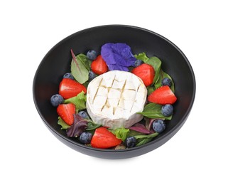 Photo of Bowl of delicious salad with brie cheese, blueberries and strawberries isolated on white