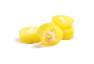 Cut ripe yellow chili pepper isolated on white