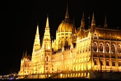 BUDAPEST, HUNGARY - APRIL 27, 2019: Beautiful night cityscape with illuminated Parliament Building