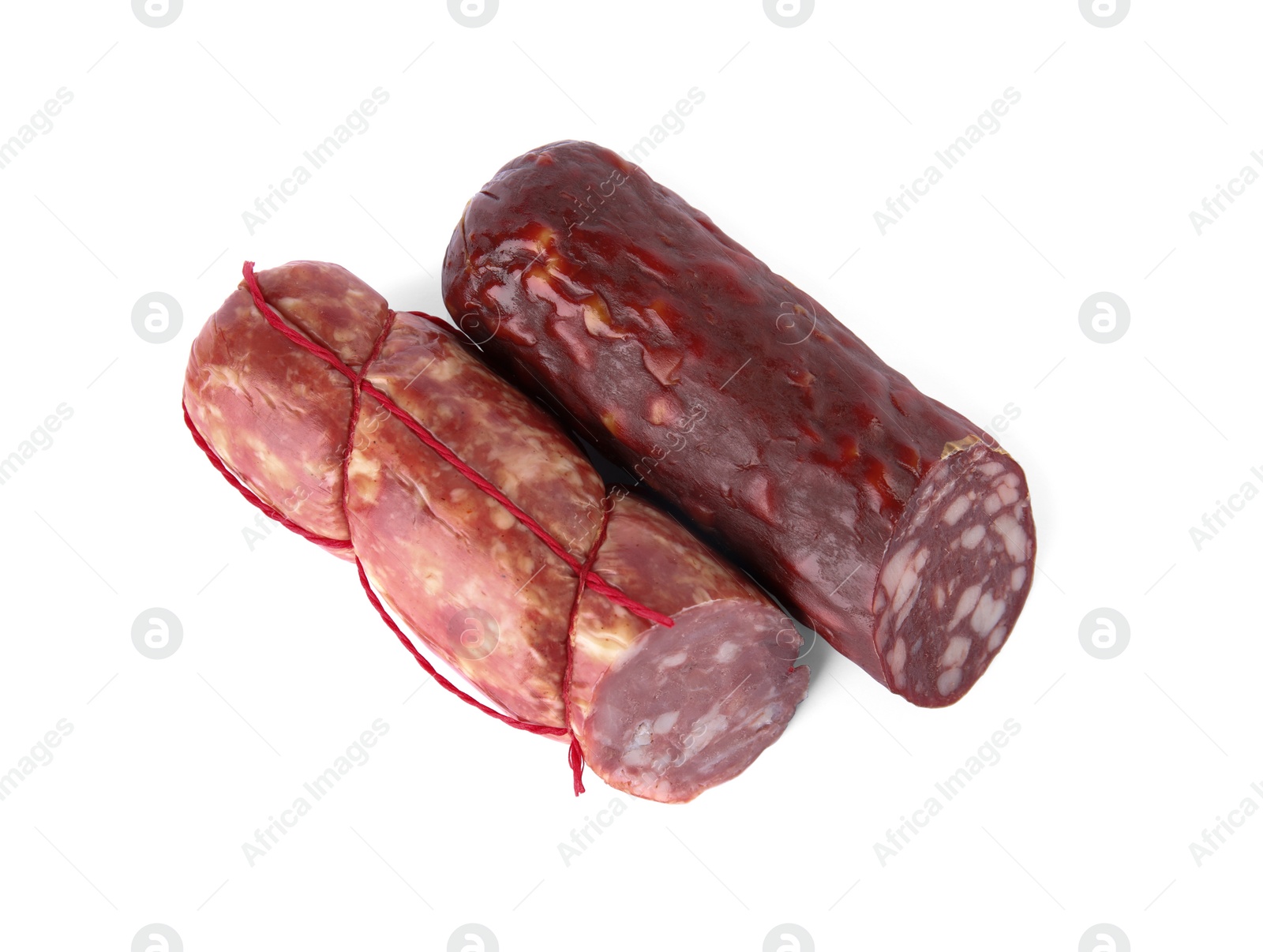 Photo of Delicious smoked sausages isolated on white. Fresh meat product