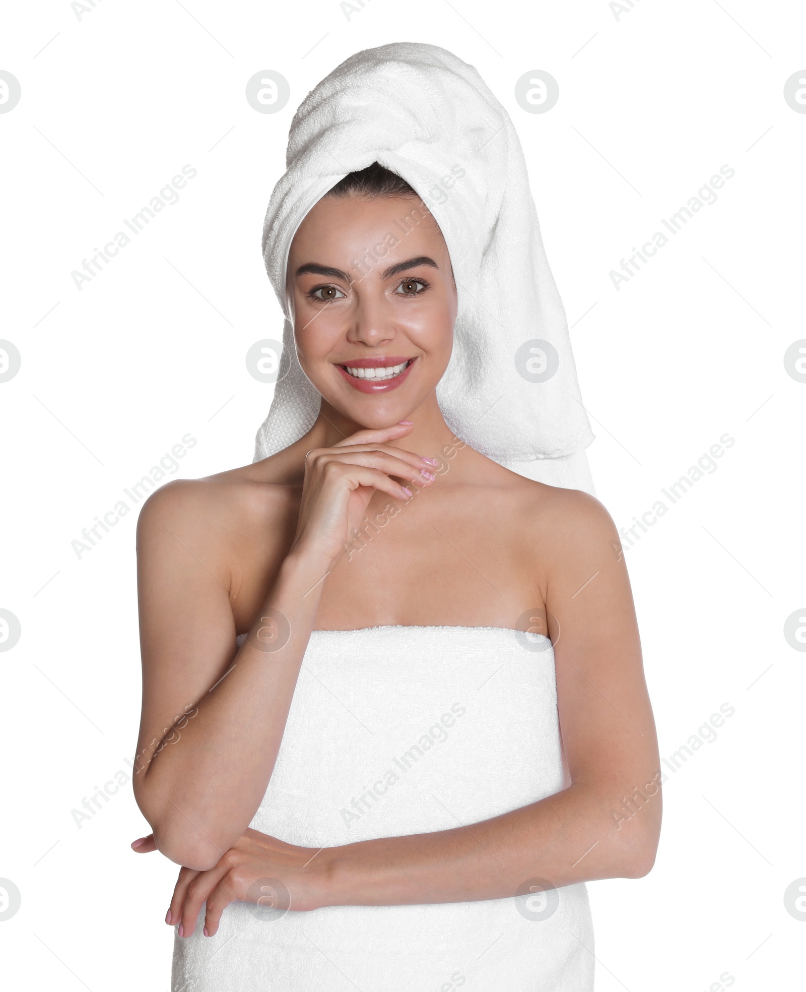 Photo of Beautiful young woman with towels on white background