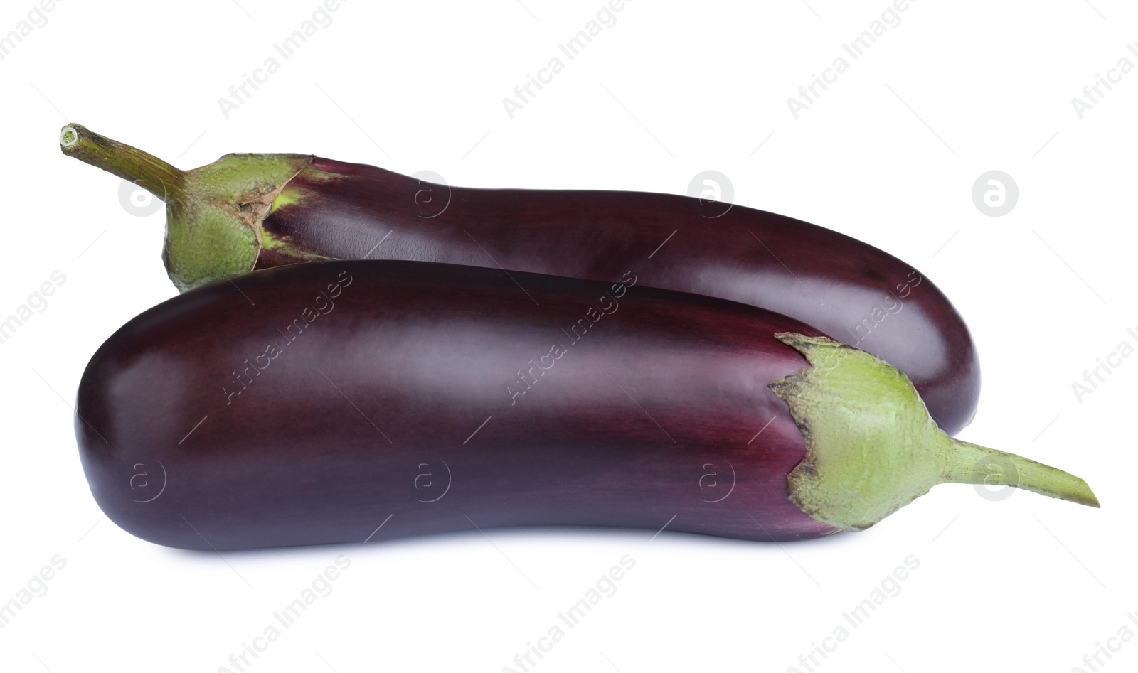 Photo of Organic fresh ripe eggplants on white background