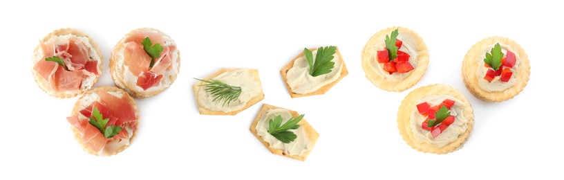 Delicious crackers with different toppings isolated on white, top view