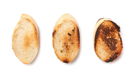 Photo of Toasted bread on white background, top view