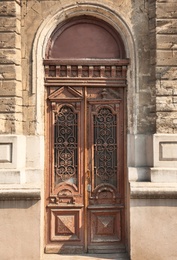 Photo of Big vintage wooden door of old building