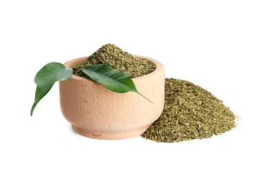 Photo of Wooden bowl with aromatic mate tea on white background