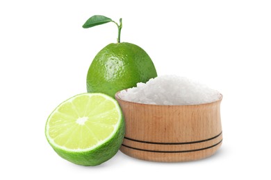 Image of Limes and salt isolated on white. Margarita cocktail ingredients