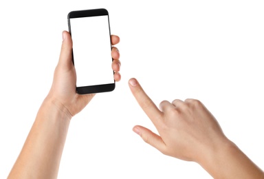 Photo of Man holding smartphone with blank screen on white background, closeup of hands. Space for text