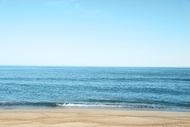 Picturesque view of sandy beach near sea