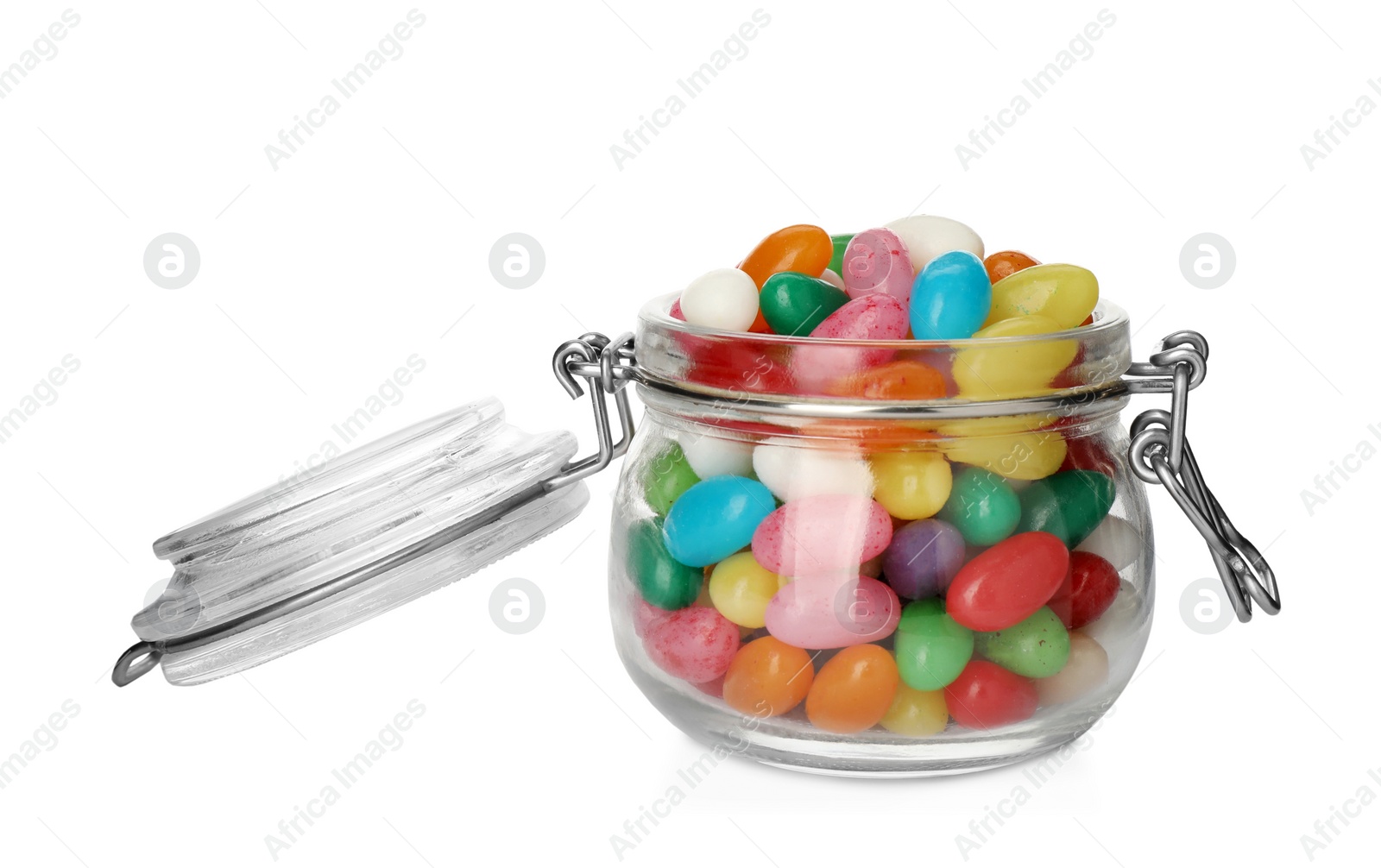 Photo of Many jelly candies in glass jar isolated on white
