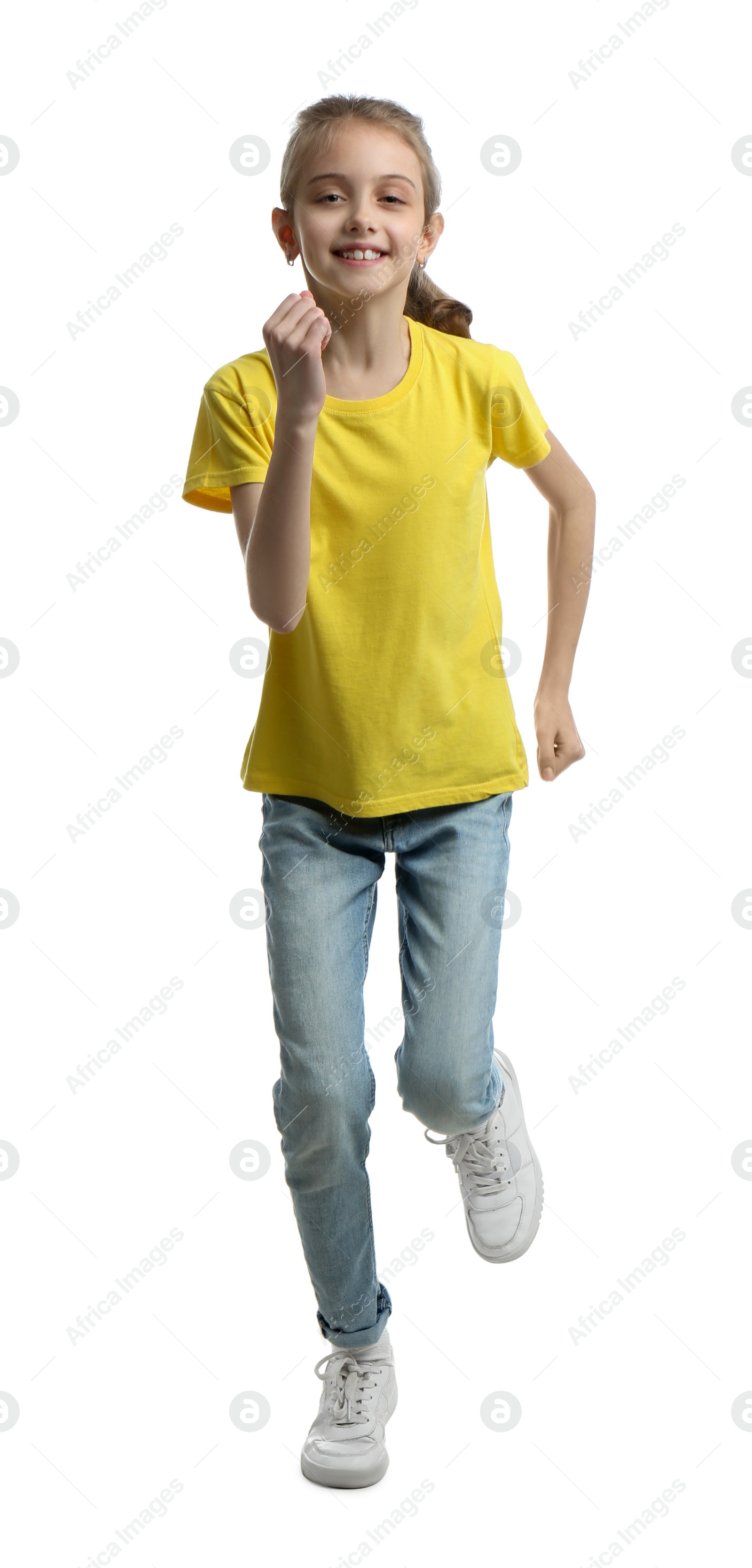 Photo of Cute little girl running on white background