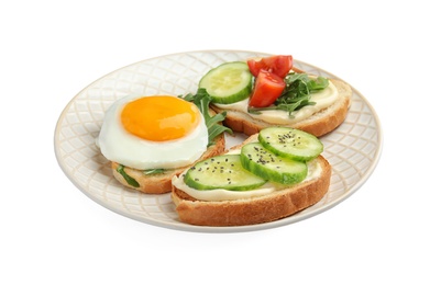 Photo of Slices of bread with different toppings on white background