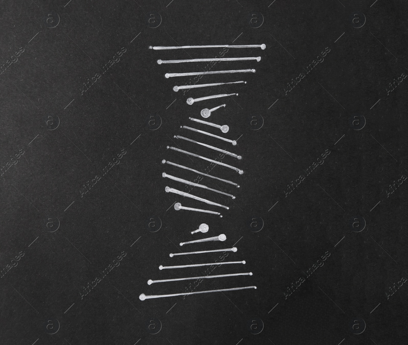 Photo of Drawing of DNA molecular chain on black paper, top view
