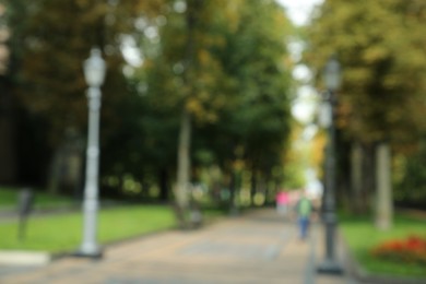 Blurred view of quiet park on sunny day