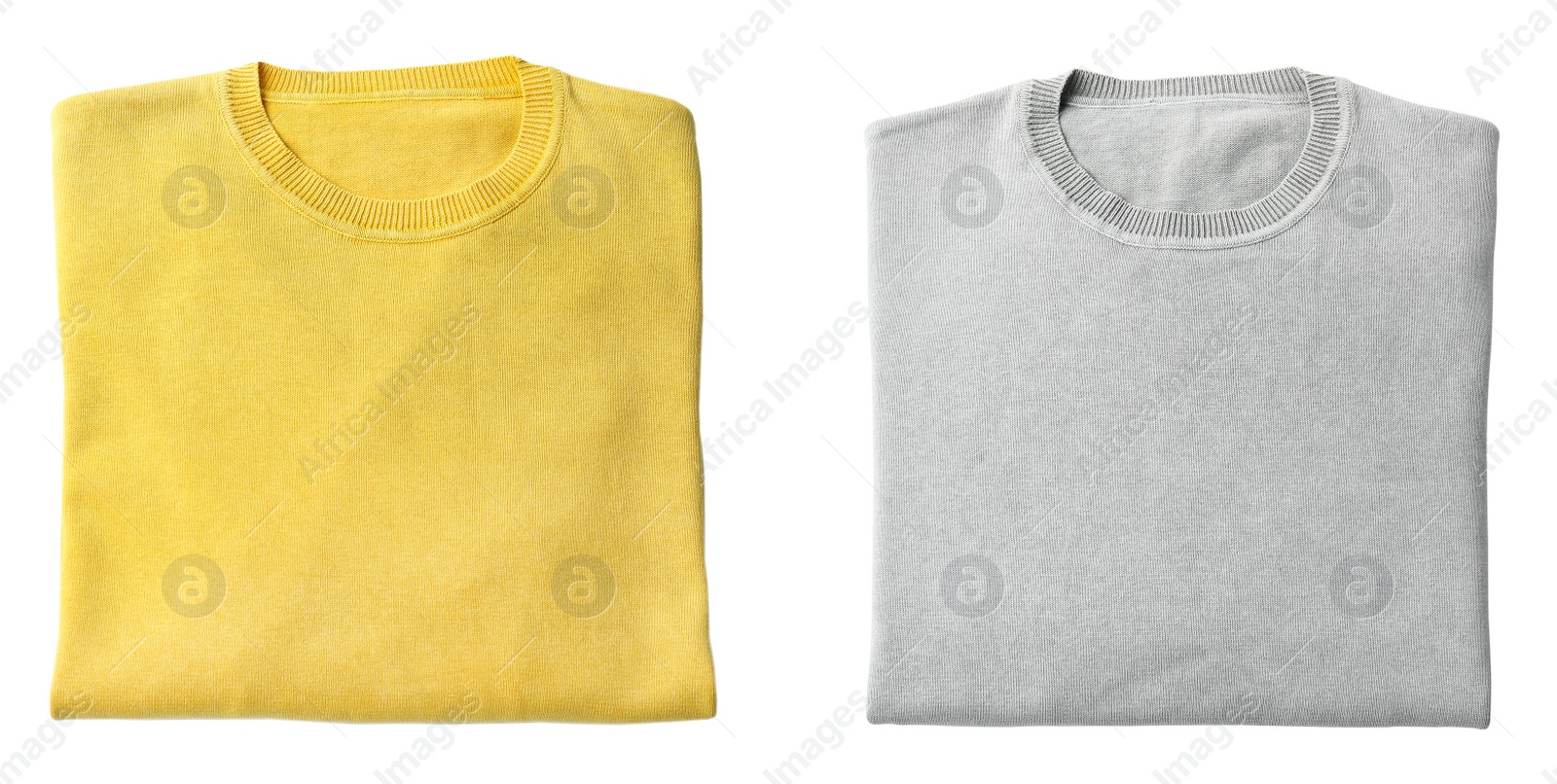 Image of Folded grey and yellow sweaters on white background, top view