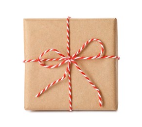 Photo of Gift box wrapped in kraft paper with bow isolated on white